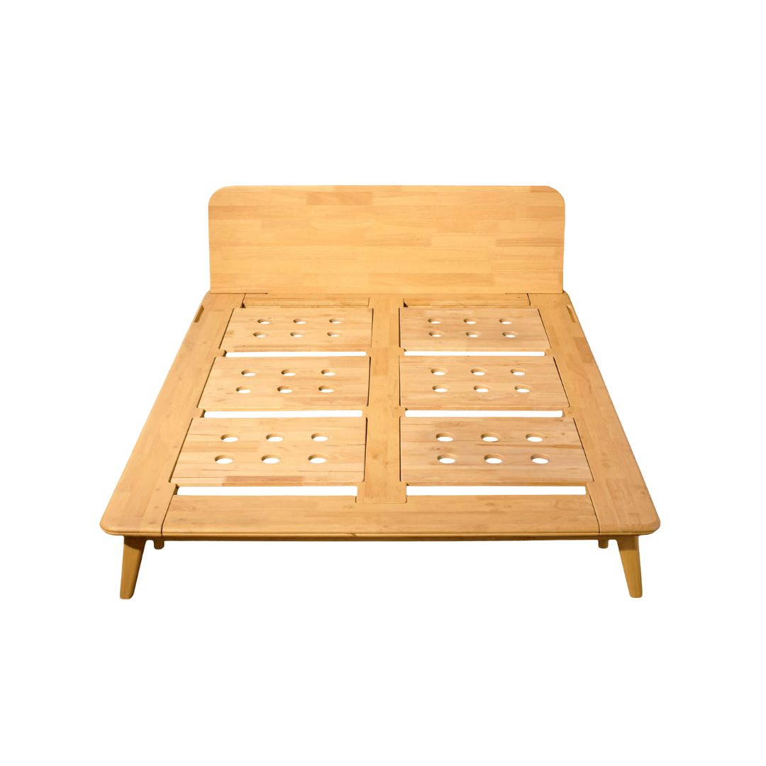 Wooden bed frame on a white background