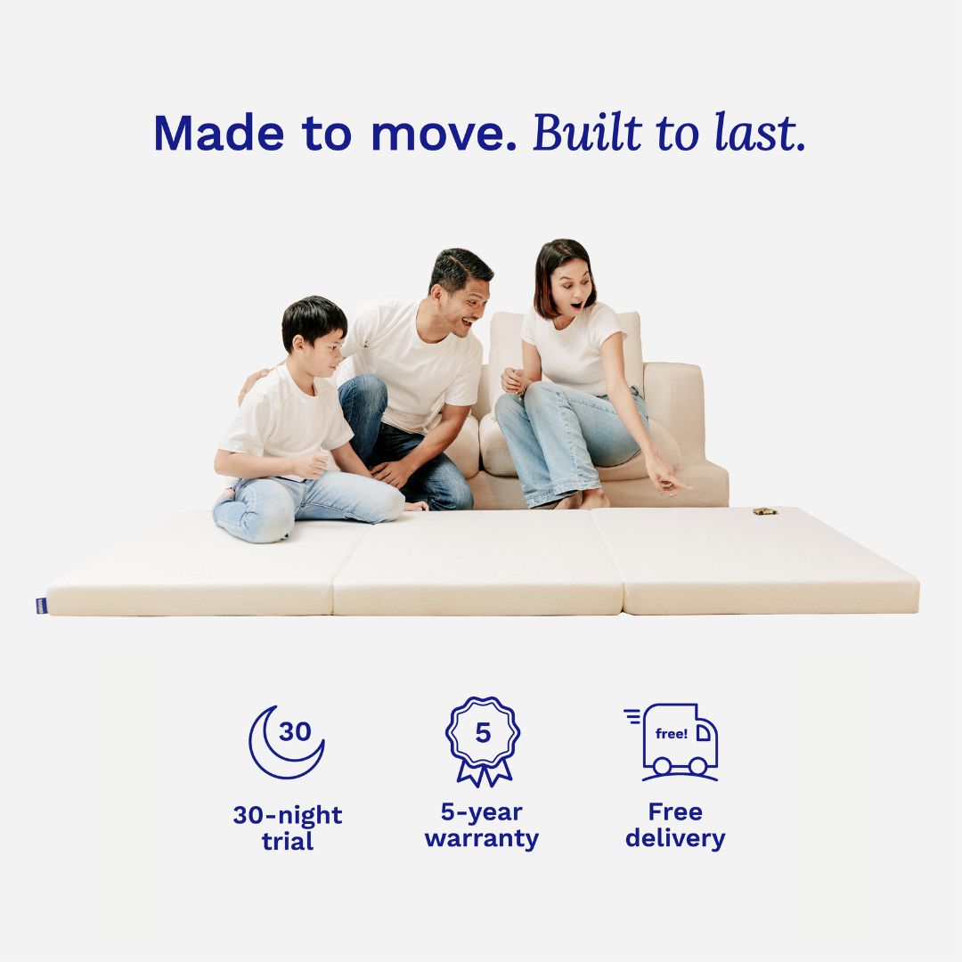 Family sitting on a Sonno foldable mattress with promotional text about trial, warranty, and delivery.