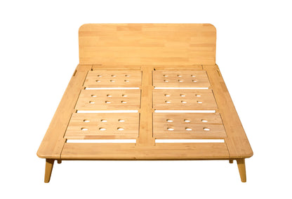 Wooden bed frame on a white background