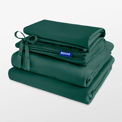 Stack of green folded sheets with a Sonno label on a white background