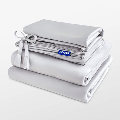 Folded gray bedding set with 'sonno' branding on a white background