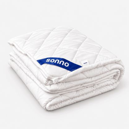 a folded sonno mattress protector waterproof on a white background