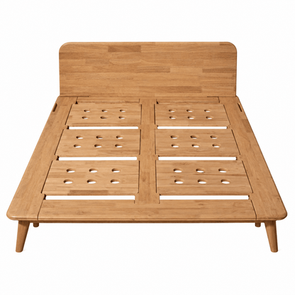 A light natural wood Sonno Signature platform bed frame with a slatted headboard and legs, shown from a top-down angle on a white background.