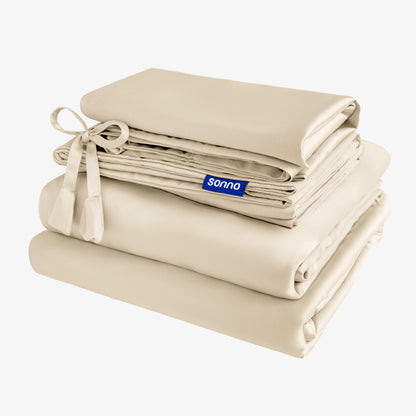 Folded beige bed sheets with a Sonno label on a white background
