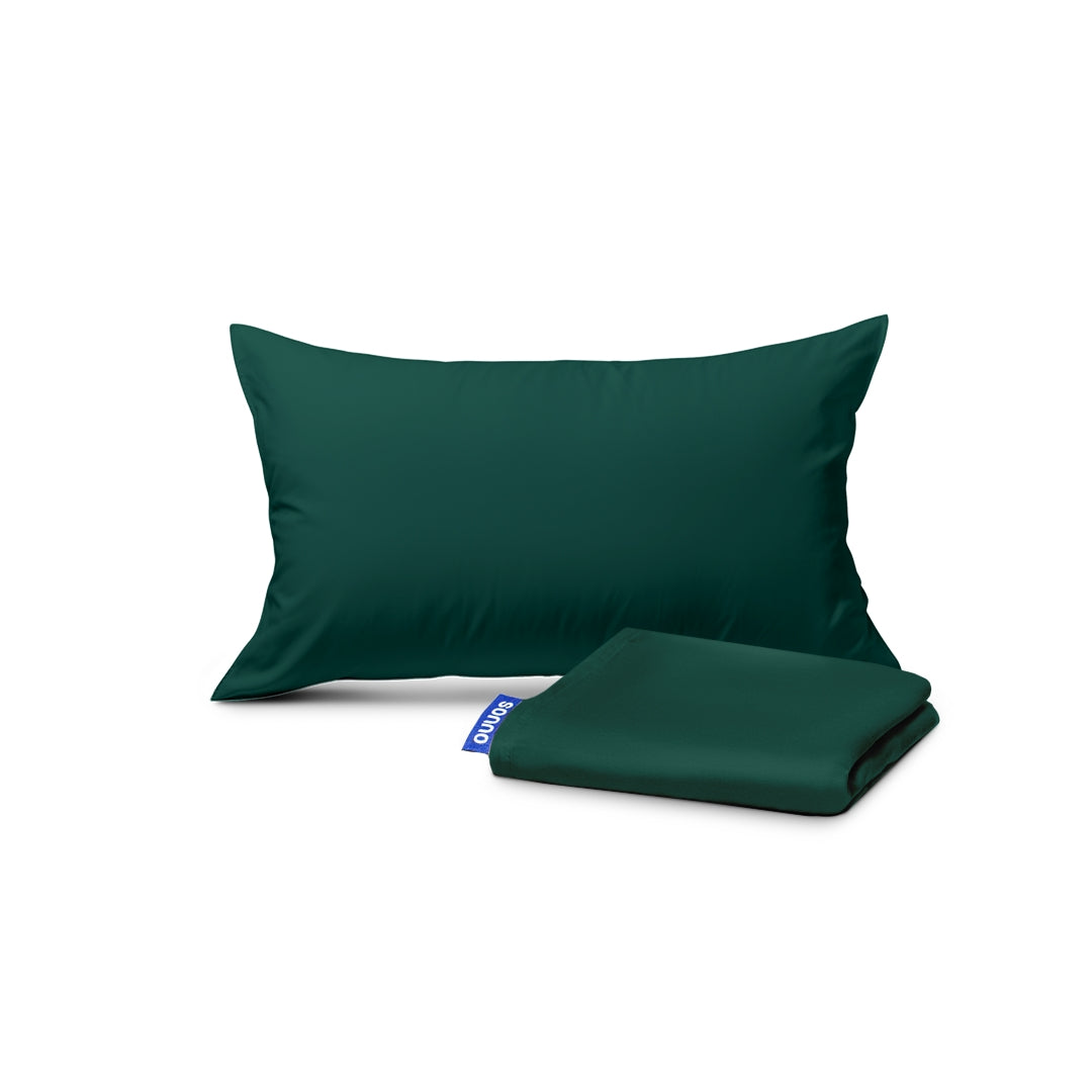 Green pillowcase and green fabric on a white background