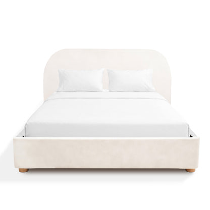 Beige upholstered bed with white bedding on a white background